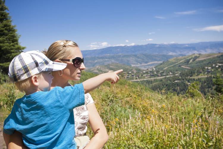 Mother And Toddler Hiking Above Park City In The Summer