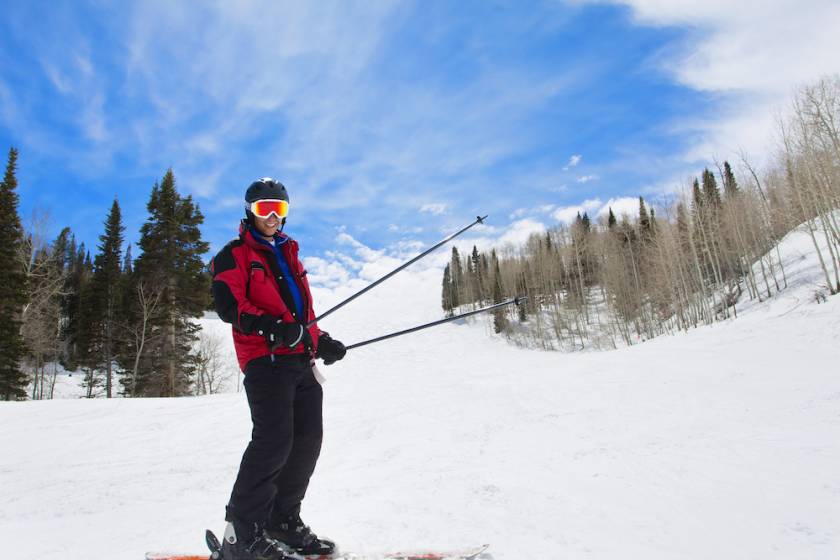 Skier at the bottom of a ski slope